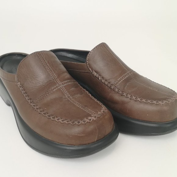 brown leather nursing clogs